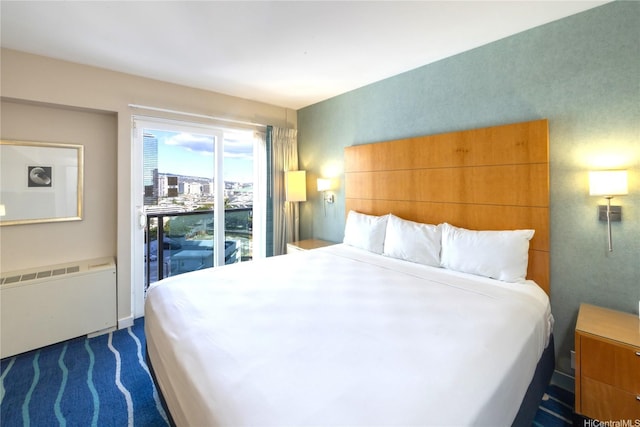 410 Atkinson Dr Unit 1337, Honolulu, HI 96814 - bedroom with radiator heating unit and dark carpet