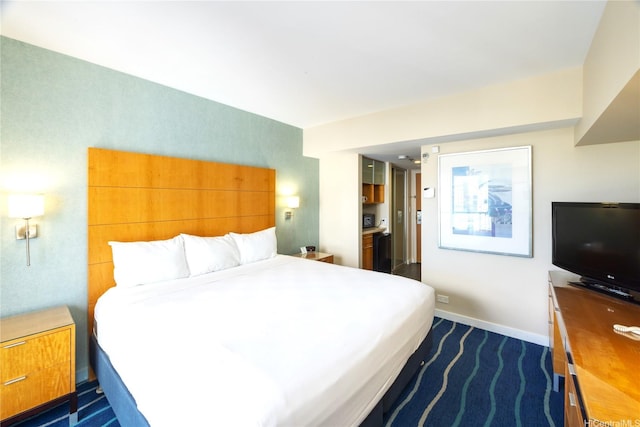 410 Atkinson Dr Unit 1337, Honolulu, HI 96814 - bedroom with dark colored carpet and baseboards
