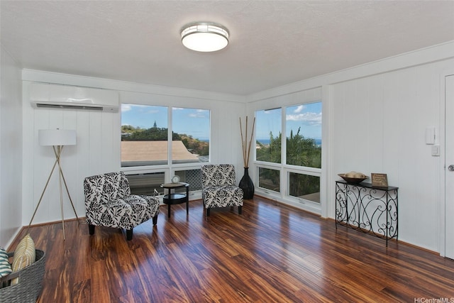92-675 Wainohia Pl, Kapolei, HI 96707 - living area featuring an AC wall unit and wood finished floors