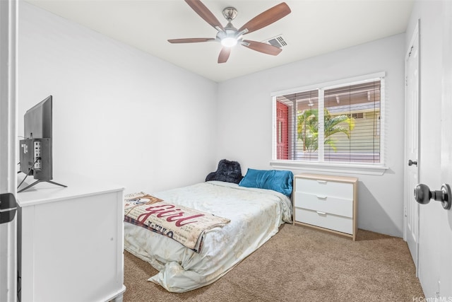 92-325 Palaulau Pl Unit 62, Kapolei, HI 96707 - bedroom featuring light colored carpet and a ceiling fan