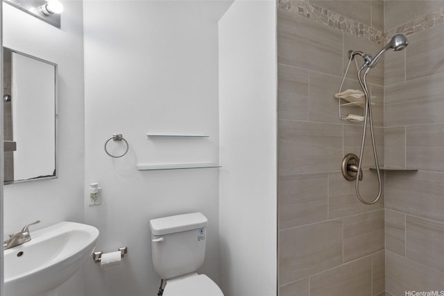 91-1028 Laulauna St Unit 9A, Ewa Beach, HI 96706 - full bathroom with a sink, tiled shower, and toilet