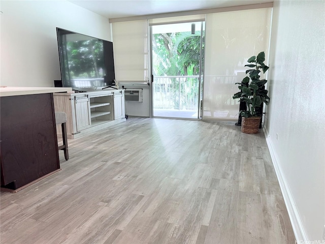 3161 Ala Ilima St Unit 206, Honolulu, HI 96818 - unfurnished living room with light wood-style floors and floor to ceiling windows
