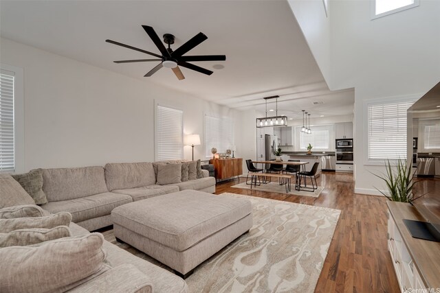 91-1067 Hoomahana St, Ewa Beach, HI 96706 - living room featuring ceiling fan and wood finished floors