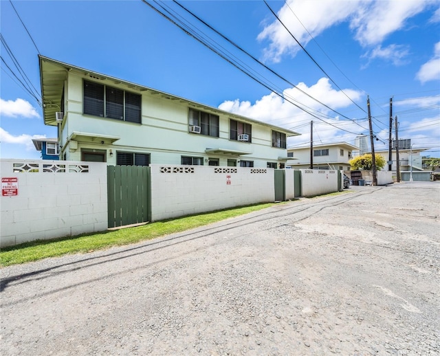713 Menehune Ln, Honolulu, HI 96826 - view of front of home with fence