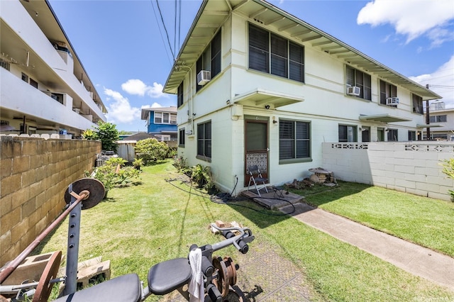 713 Menehune Ln, Honolulu, HI 96826 - rear view of house featuring cooling unit