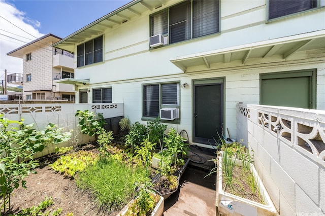 713 Menehune Ln, Honolulu, HI 96826 - view of exterior entry with fence and cooling unit