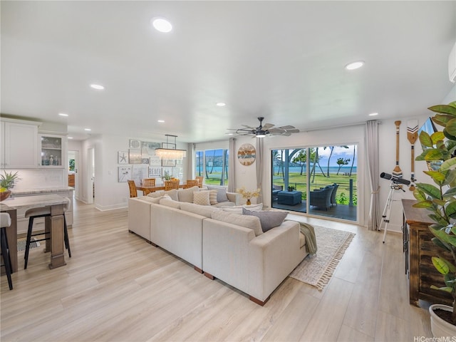 6173 Summer St, Honolulu, HI 96821 - living room featuring recessed lighting, light wood finished floors, and ceiling fan