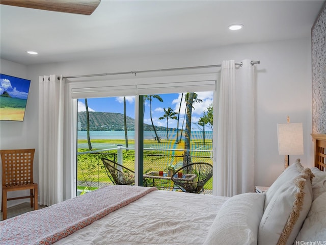 6173 Summer St, Honolulu, HI 96821 - bedroom with access to exterior, a water view, and recessed lighting