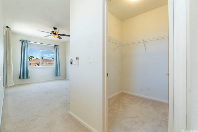 540 Manawai St Unit 402, Kapolei, HI 96707 - walk in closet with carpet flooring and ceiling fan