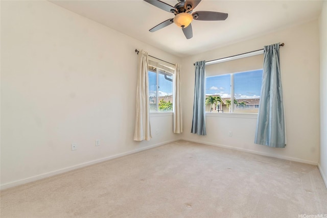 540 Manawai St Unit 402, Kapolei, HI 96707 - empty room with light colored carpet, ceiling fan, and baseboards