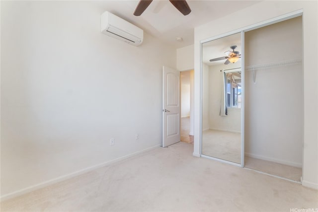 540 Manawai St Unit 402, Kapolei, HI 96707 - unfurnished bedroom with a wall mounted air conditioner, carpet flooring, a closet, and ceiling fan