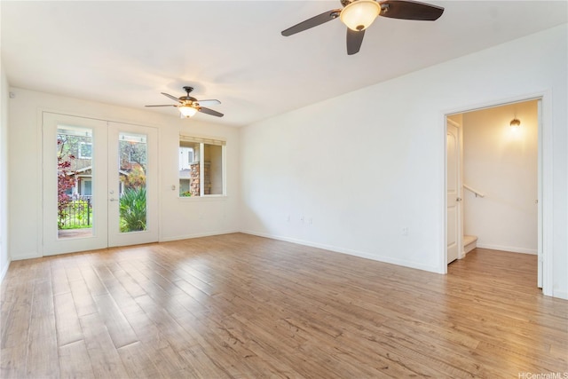 540 Manawai St Unit 402, Kapolei, HI 96707 - unfurnished room featuring ceiling fan, stairs, and light wood-type flooring