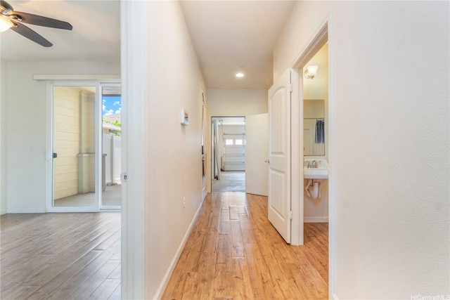 540 Manawai St Unit 402, Kapolei, HI 96707 - corridor featuring light wood finished floors, recessed lighting, and baseboards