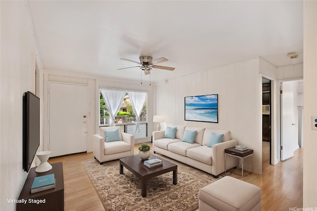 1916 Huina St, Honolulu, HI 96817 - living room with light wood finished floors and ceiling fan