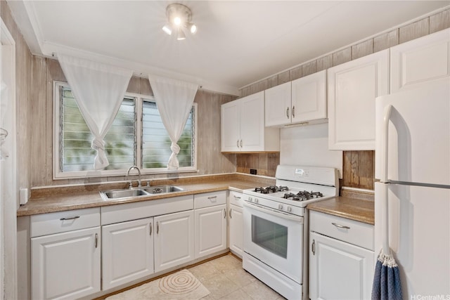 1916 Huina St, Honolulu, HI 96817 - kitchen featuring white appliances, a sink, white cabinetry, and light tile patterned floors