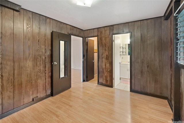 1916 Huina St, Honolulu, HI 96817 - spare room featuring light wood-style flooring and wood walls