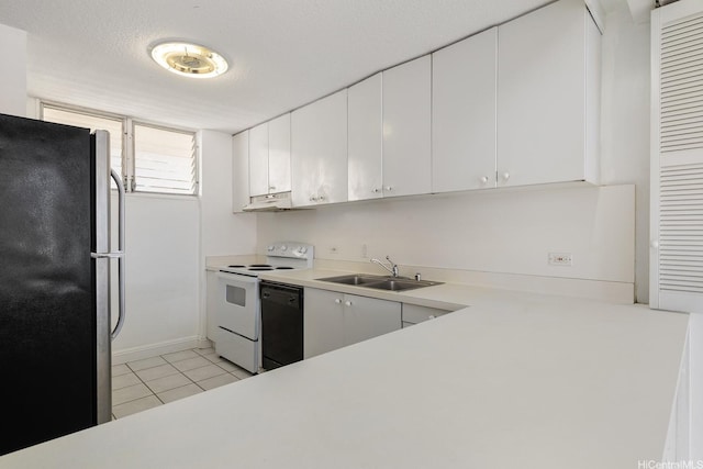 1515 Ward Ave Unit 304, Honolulu, HI 96822 - kitchen with freestanding refrigerator, a sink, electric stove, black dishwasher, and under cabinet range hood