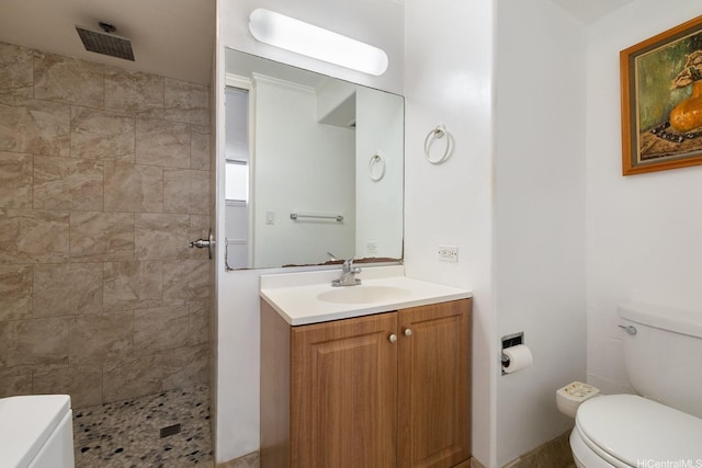 1515 Ward Ave Unit 304, Honolulu, HI 96822 - full bath featuring toilet, vanity, and a tile shower