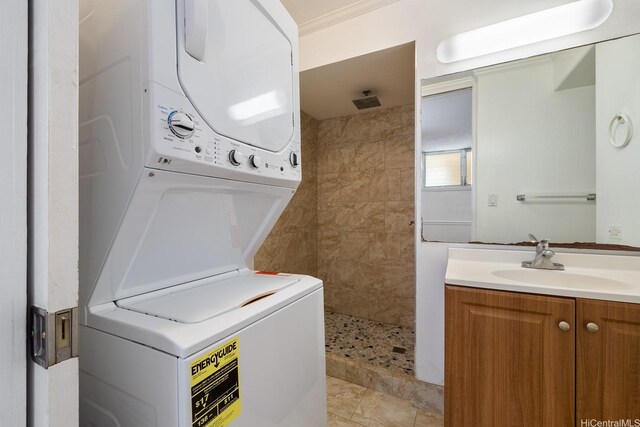 1515 Ward Ave Unit 304, Honolulu, HI 96822 - laundry room with stacked washer / dryer