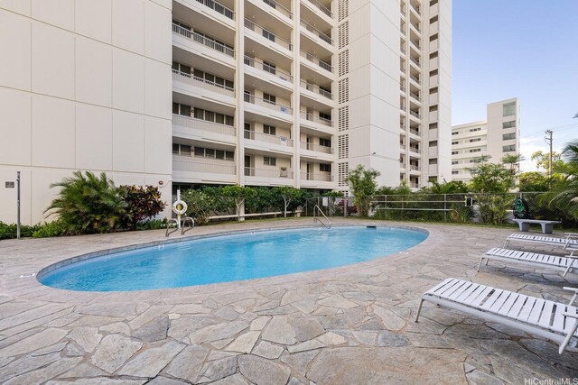 1515 Ward Ave Unit 304, Honolulu, HI 96822 - community pool with a patio area