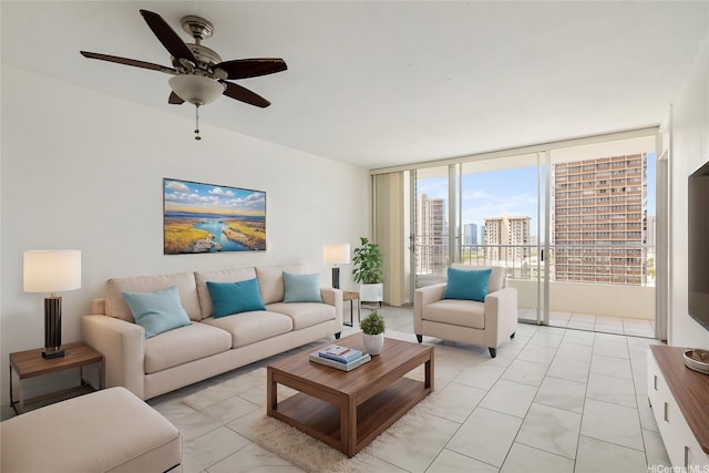 1515 Ward Ave Unit 304, Honolulu, HI 96822 - living room with light marble finish floors, ceiling fan, and a wall of windows