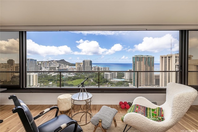 1910 Ala Moana Blvd Unit 35C, Honolulu, HI 96815 - living area with wood finished floors, a view of city, and a water view