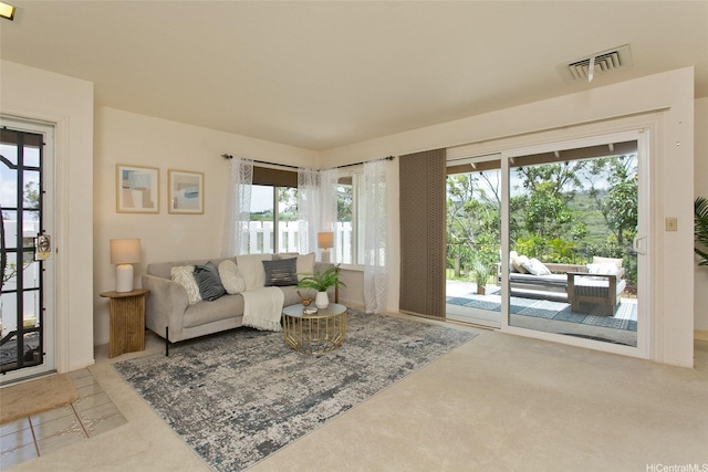 98-1970-A Kaahumanu St Unit 128, Pearl City, HI 96782 - living area with plenty of natural light and carpet floors