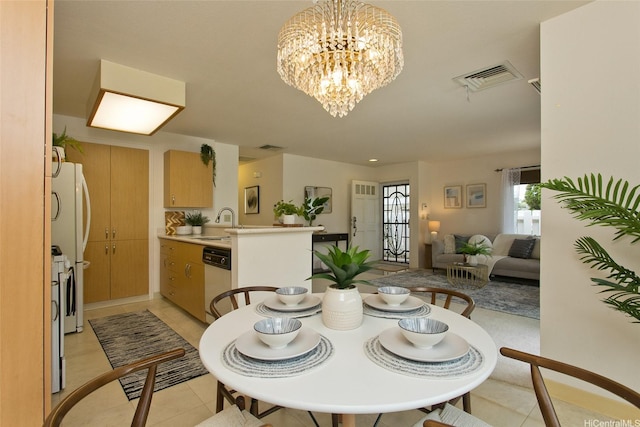 98-1970-A Kaahumanu St Unit 128, Pearl City, HI 96782 - dining room with a chandelier and light tile patterned floors