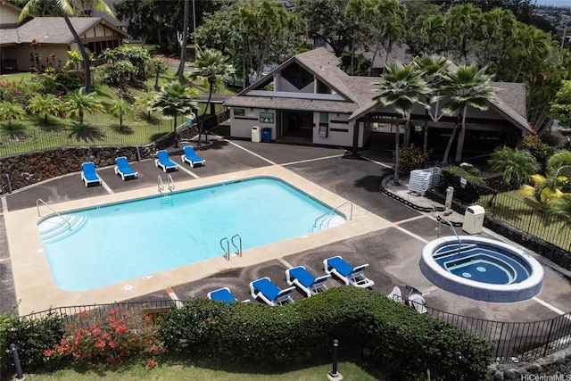 98-1970-A Kaahumanu St Unit 128, Pearl City, HI 96782 - community pool featuring a patio area and fence