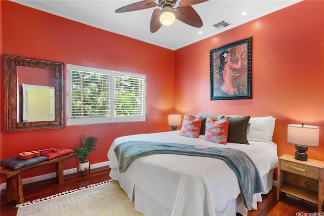 bedroom featuring wood finished floors, baseboards, a ceiling fan, and recessed lighting