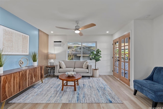 92-370 Malahuna Pl, Kapolei, HI 96707 - living room featuring wood finished floors, baseboards, french doors, a ceiling fan, and an AC wall unit