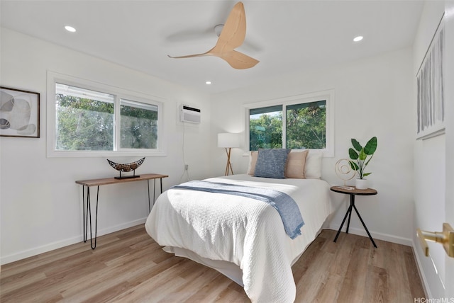 92-370 Malahuna Pl, Kapolei, HI 96707 - bedroom with light wood-style floors, recessed lighting, ceiling fan, baseboards, and a wall mounted AC