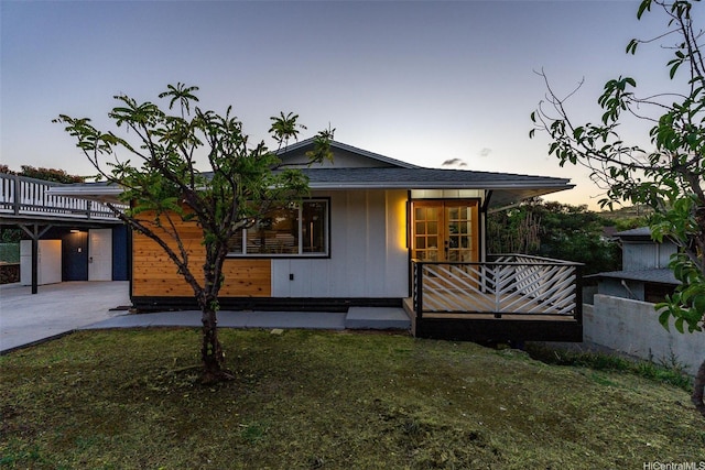 92-370 Malahuna Pl, Kapolei, HI 96707 - view of front of home with covered porch and a wooden deck