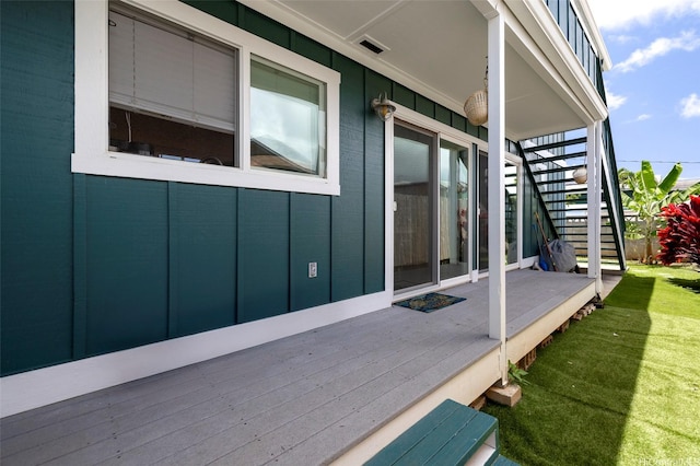 245 Hualani St Unit B, Kailua, HI 96734 - wooden deck featuring stairs and a yard