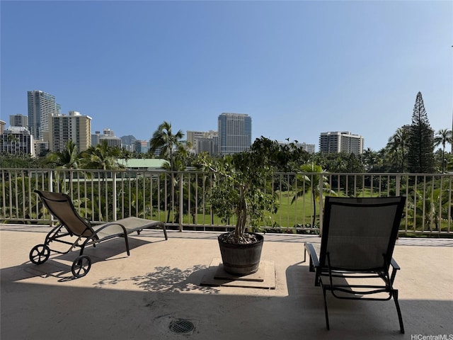 1920 Ala Moana Blvd Unit 915, Honolulu, HI 96815 - view of patio with a city view