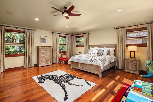 4462 Kahala Ave, Honolulu, HI 96816 - bedroom with wood finished floors, recessed lighting, ceiling fan, and lofted ceiling