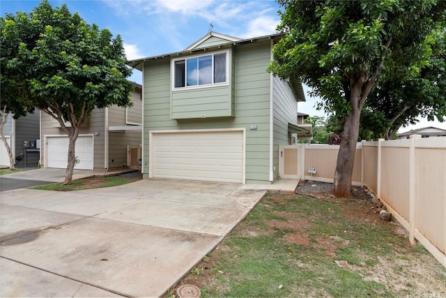 91-1043 Hoomaka St Unit 48, Ewa Beach, HI 96706 - traditional home with fence, a garage, and concrete driveway