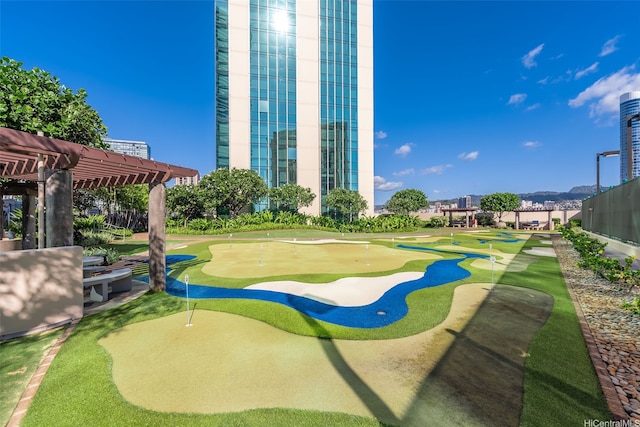 1177 Queen St Unit 4509, Honolulu, HI 96814 - view of property's community with an area to practice putting and a pergola