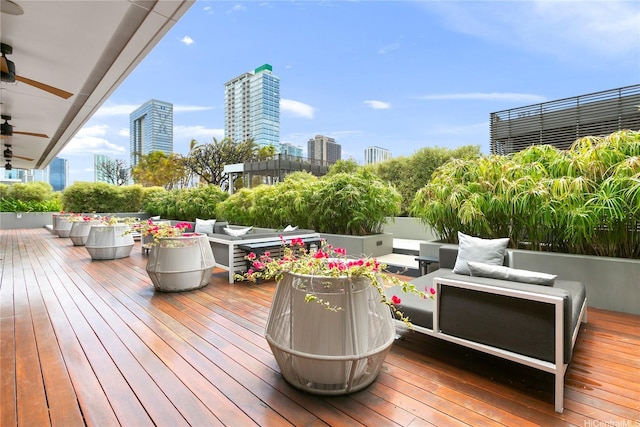 888 Kapiolani Blvd Unit 2108, Honolulu, HI 96813 - deck featuring outdoor lounge area, ceiling fan, and a view of city