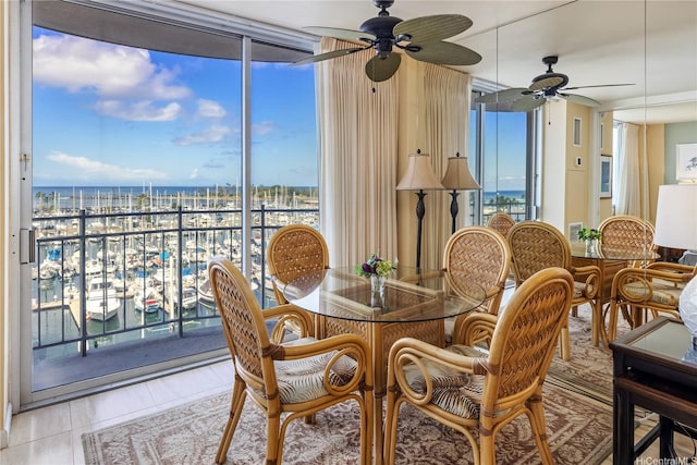 1765 Ala Moana Blvd Unit 790, Honolulu, HI 96815 - dining room with a water view, ceiling fan, and tile patterned flooring