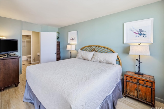 1765 Ala Moana Blvd Unit 790, Honolulu, HI 96815 - bedroom featuring light tile patterned floors and ensuite bathroom