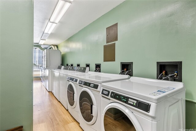 1765 Ala Moana Blvd Unit 790, Honolulu, HI 96815 - shared laundry with washer and dryer and light wood-type flooring