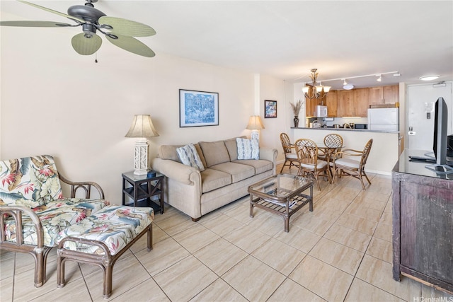 1765 Ala Moana Blvd Unit 1286, Honolulu, HI 96815 - living room featuring a chandelier, light tile patterned floors, rail lighting, and a ceiling fan