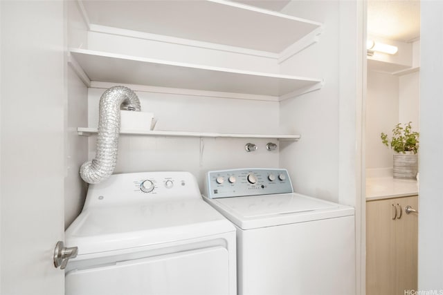 1520 Ward Ave Unit 802, Honolulu, HI 96822 - laundry area with washing machine and clothes dryer