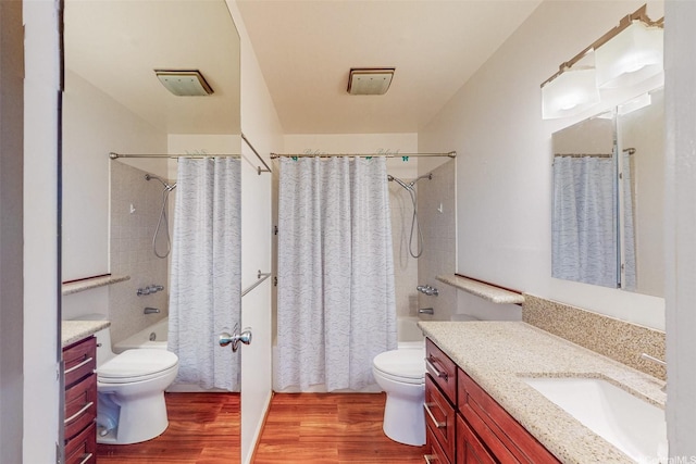 44-3082 Olina St Unit 5/2, Kaneohe, HI 96744 - bathroom with toilet, wood finished floors, shower / bath combination with curtain, and vanity