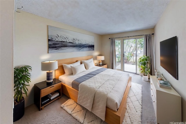 44-3082 Olina St Unit 5/2, Kaneohe, HI 96744 - bedroom featuring access to outside, carpet, and a textured ceiling