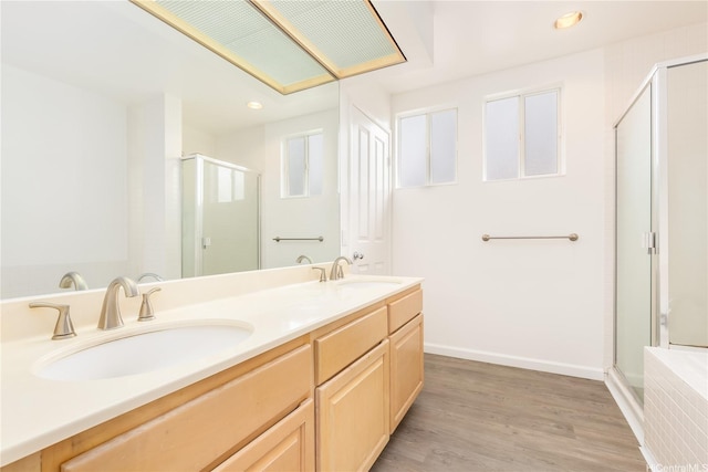 1340 Moanalualani Pl Unit 4D, Honolulu, HI 96819 - full bath with a stall shower, double vanity, wood finished floors, recessed lighting, and baseboards