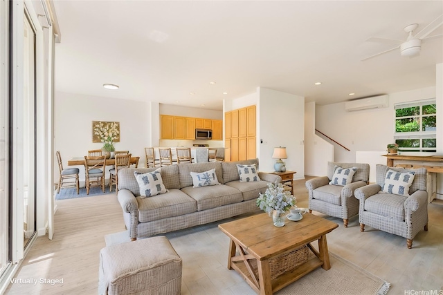 1340 Moanalualani Pl Unit 4D, Honolulu, HI 96819 - living room with a wall unit AC, light wood-style flooring, ceiling fan, and recessed lighting