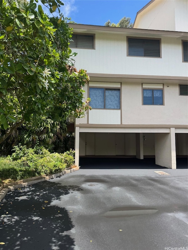 95-146 Kuahelani Ave Unit 131, Mililani, HI 96789 - view of front facade with driveway