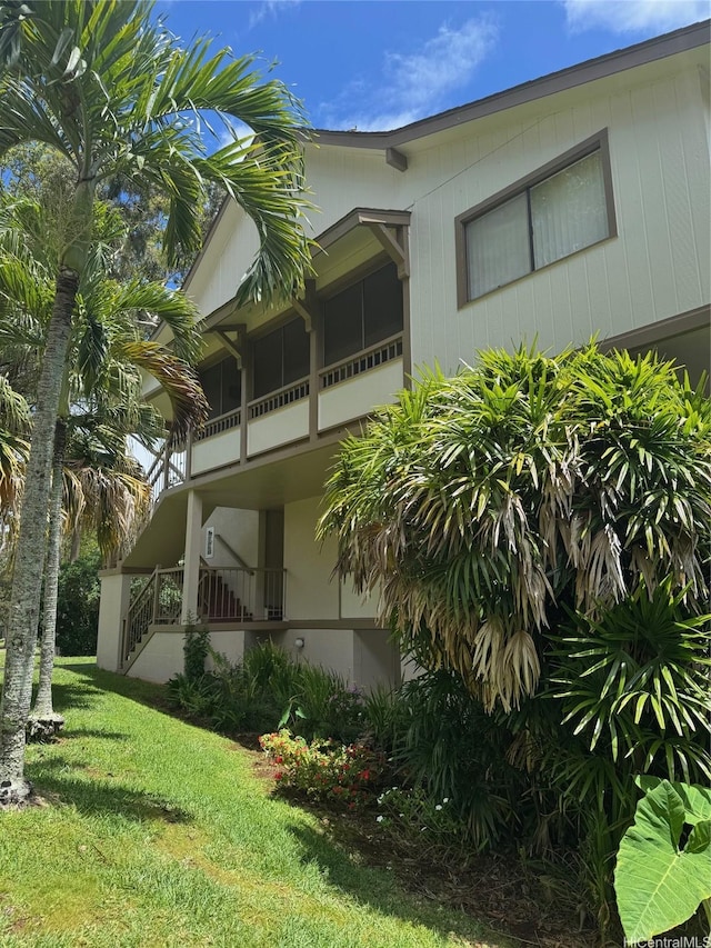 95-146 Kuahelani Ave Unit 131, Mililani, HI 96789 - view of property exterior with a lawn
